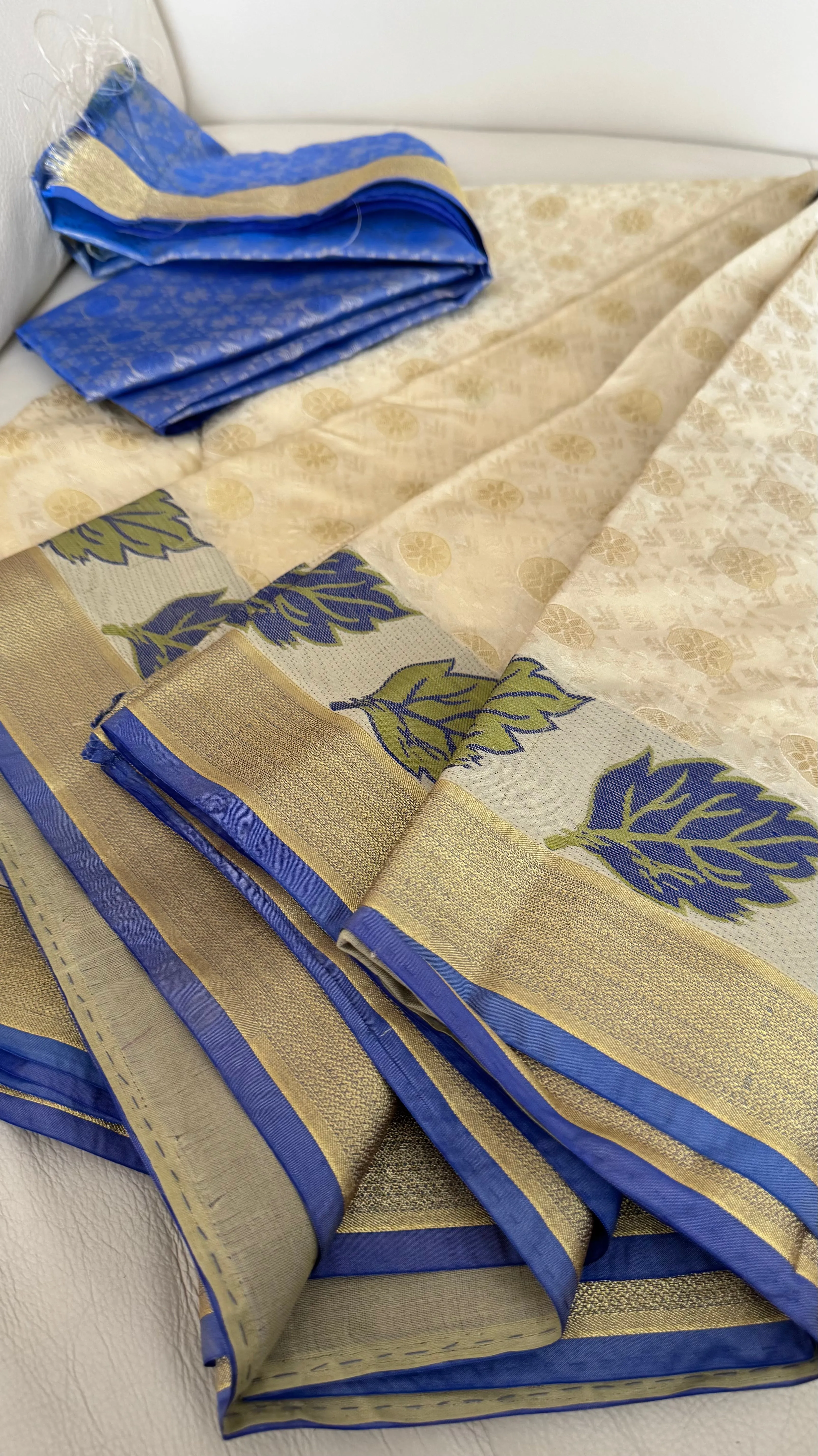 Blended Off White Floral Silk Saree with Blue