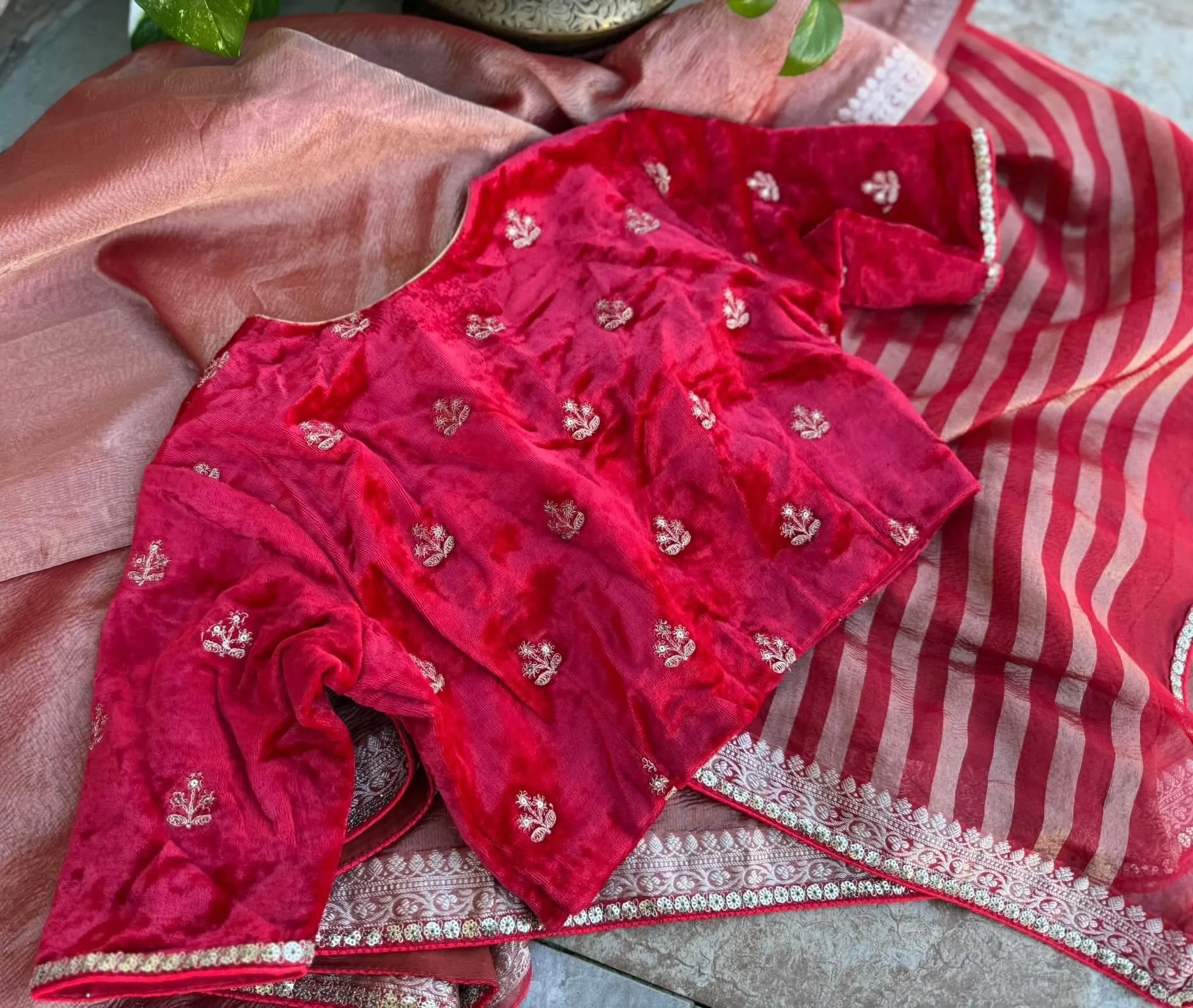 Red crushed embroidered tissue silk paired with a velvet blouse